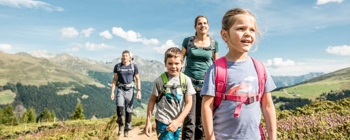 A family hiking in Davos Klosters