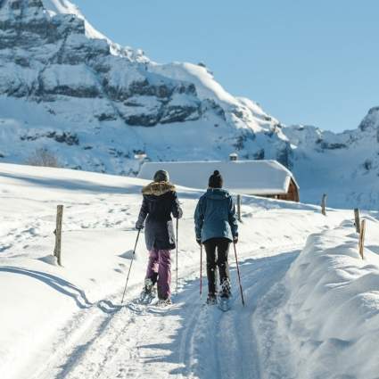 Winter Hiking in a snow covered landscape