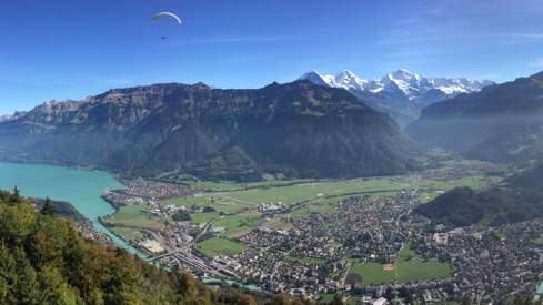 View of Interlaken and Lake Brienz. In the distance you can see the Eiger, Mönch and Jungfrau.