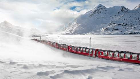 Bernina Express in a winter landscape.