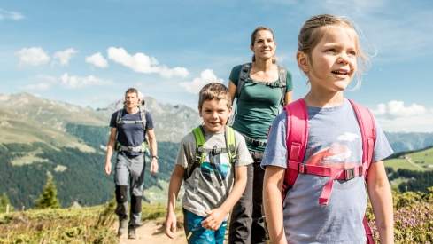 A family hiking in Davos Klosters